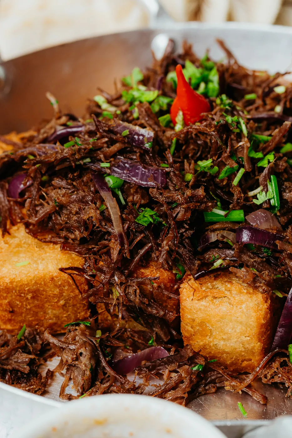 Carne de sol com cubos de macaxeira